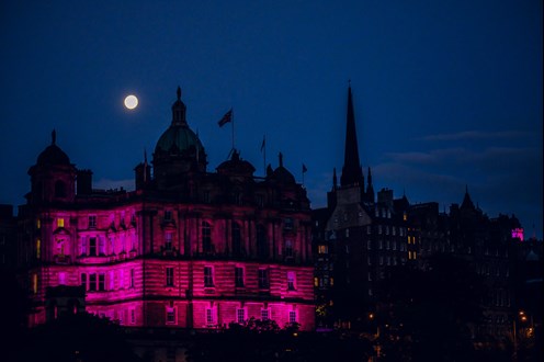Edinbutgh lit up pink at The MoonWalk Scotland